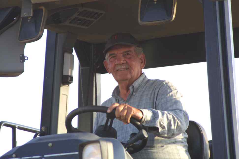 Papa John relaxing in his giant earth mover